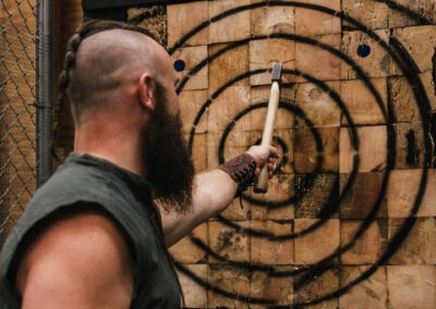 Man on Axe Throwing Event